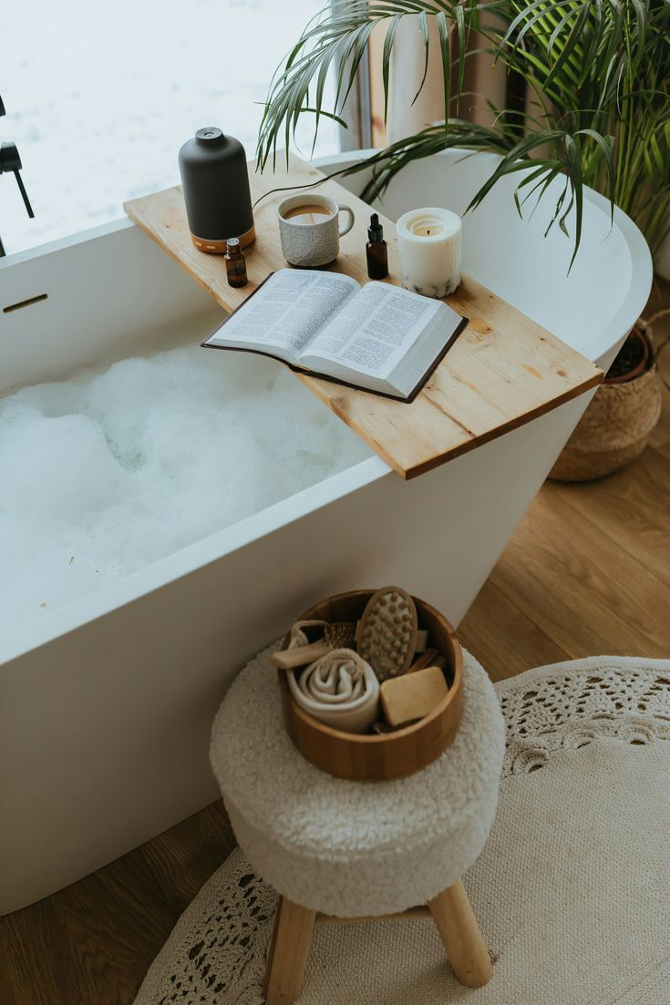 In-villa spa bathtub setup with aromatic oils and candles, Koh Samui